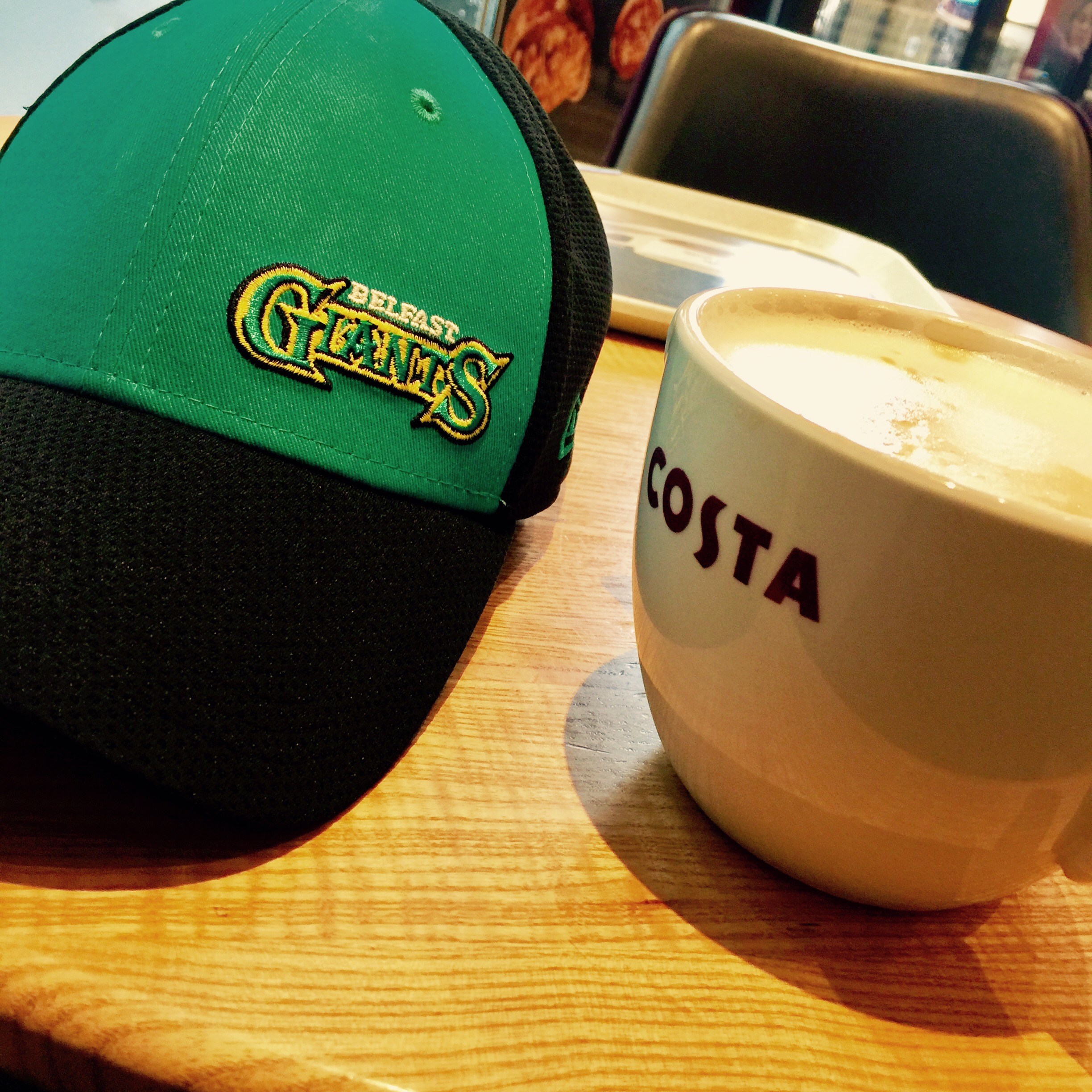 A Giant coffee and a Giants cap.